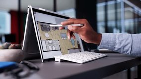 Analyzing House Floor Plan On Digital Tablet: African-American Architect Renovating Hybrid Property For Real Estate Business With Designer. - Powered by Shutterstock - Get 15% off with code: PIKWIZARD15