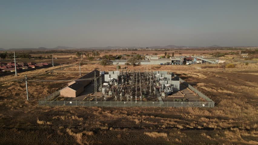 Electricity Distribution Station Aerial Drone Shot at Sunset