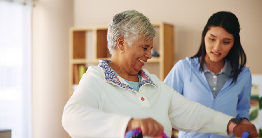 Physiotherapist, senior woman or exercise with resistance band for rehabilitation or injury recovery support. Physical therapy, professional or patient with stretching for health treatment or fitness