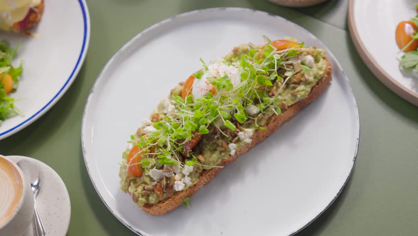 Pan of Danish sandwich with healthy microgreens and salad side, Copenhagen