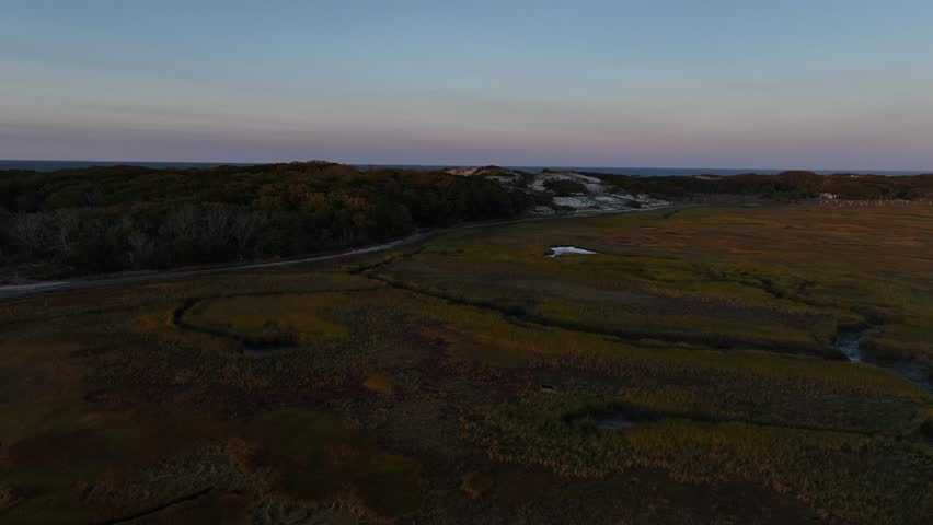 Salt Marsh and sand dunes at sunset Cape Cod, Barnstable, Massachusetts, USA