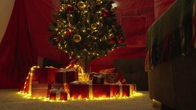 In this enchanting Christmas scene, a beautifully decorated tree adorned with twinkling lights stands proudly amidst a mountain of wrapped gifts, radiating warmth, love, and joy in abundance - Powered by Shutterstock - Get 15% off with code: PIKWIZARD15