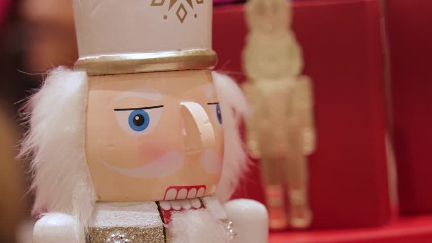 Head and uniform of painted wooden nutcracker christmas decoration