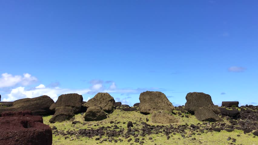 Moais under construction in a beautiful sunny landscape over Vaihu – Ahu Hanga Te’e or Ahu Hanga Tee in a summer day in Easter Island, Rapa Nui, Polynesia, Chile, Latin America.