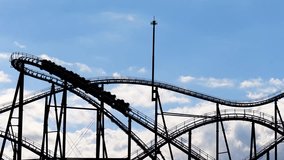 amusement park attraction roller coaster and the sky on a clear day,
 - Powered by Shutterstock - Get 15% off with code: PIKWIZARD15