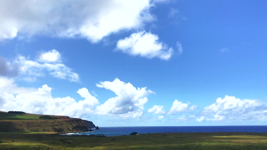 A beautiful sunny landscape from Ahu Tongariki Moai in a summer day in Easter Island, Rapa Nui, Polynesia, Chile, Latin America. Video with copy space.