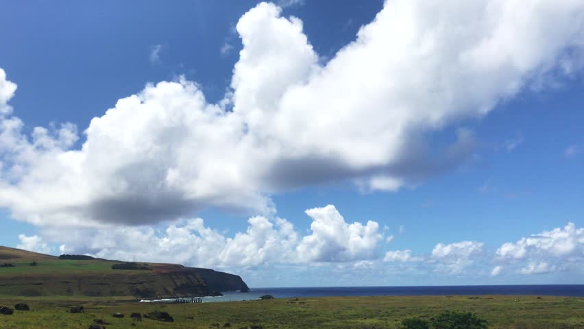 A beautiful sunny landscape from Ahu Tongariki Moai in a summer day in Easter Island, Rapa Nui, Polynesia, Chile, Latin America. Video with copy space.