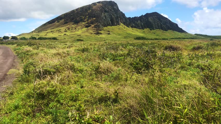 A beautiful sunny landscape over Ranu a Raraku in a summer day in Easter Island, Rapa Nui, Polynesia, Chile, Latin America