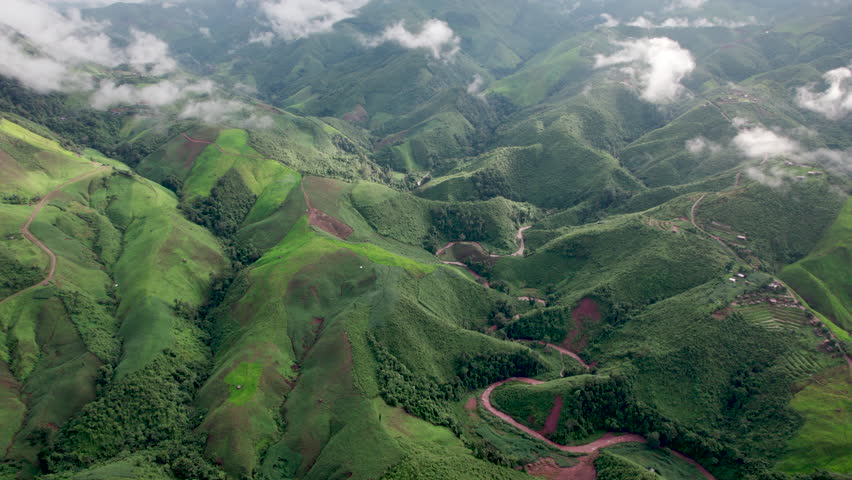 Landscape of Morning Mist with Mountain Layer. mountain ridge and clouds in rural jungle bush forest