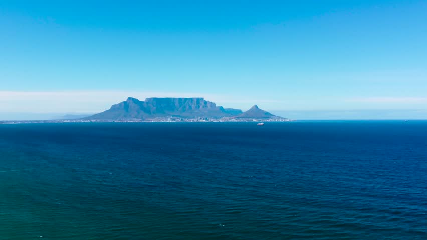 Table Mountain to Robben Island camera panning over Table Bay South Africa.