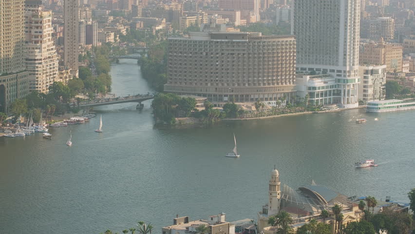 Felucca boats sailing down Nile river in Cairo, Egypt