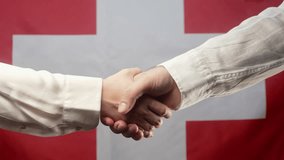 Swiss Man And Woman Business Partners Shaking Hands.handshake,Make Deal, Switzerland - Powered by Shutterstock - Get 15% off with code: PIKWIZARD15