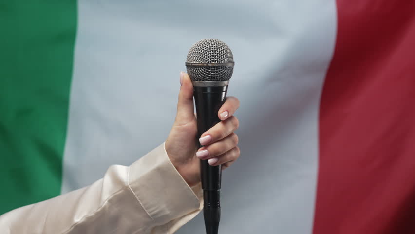 Woman Singer Or Tv Presenter Holding Mic, Mike Or Microphone In Hand On Italy Flag. Italian news, interview, press conference, musical competition or music concert