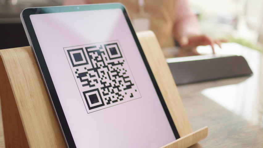 Man scanning qr code, paying with smartphone closeup. Successful electronic payment. Digital money transaction system at store counter