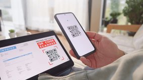 Woman scanning invoice qr code and confirming with fingerprint for online payment. Paying and approving identity with secure biometric technology - Powered by Shutterstock - Get 15% off with code: PIKWIZARD15
