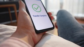 Woman confirming cryptocurrency payment on smartphone. Person hand clicking button on mobile screen while paying with crypto wallet online close up - Powered by Shutterstock - Get 15% off with code: PIKWIZARD15