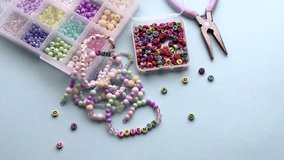 Crafting friendship bracelets with colorful beads - Powered by Shutterstock - Get 15% off with code: PIKWIZARD15