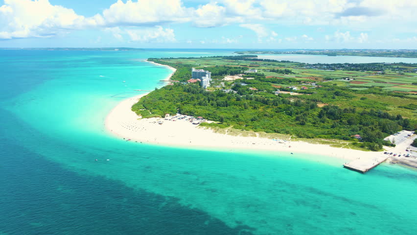 Cinematic aerial flyover of Yonaha Maehama Beach in Miyakojima Island in Okinawa, Japan