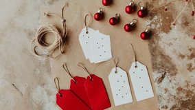 Festive Holiday Gift Tags With Ornaments And Twine On Rustic Background - Powered by Shutterstock - Get 15% off with code: PIKWIZARD15