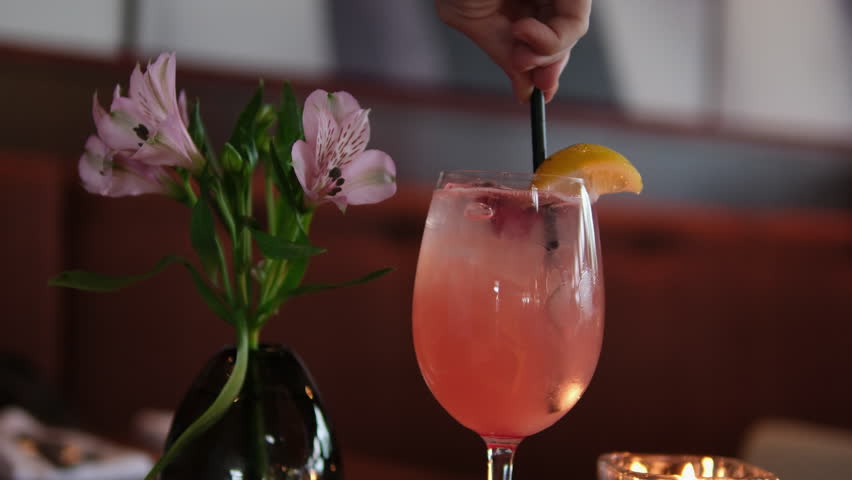 pink drink with ice video fresh product strawberry splash drinks drips fresh water on glass