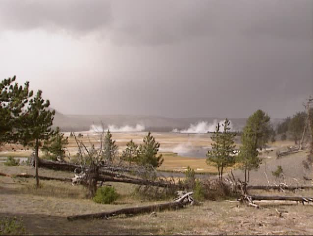 Dark sky above Midway Geyser Basin in Yellowstone National Park, autumn.  This basin is also known as  Hell