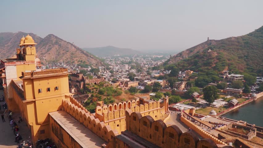 View of Jaipur city as seen from Amer Fort in Jaipur, Rajasthan, India. Travel and holidays concept. Ancient Indian city Jaipur with Aravalli Hills in background. 