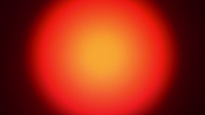 Looped round light leaks in orange, red and yellow. Abstract background, overlay or design element.