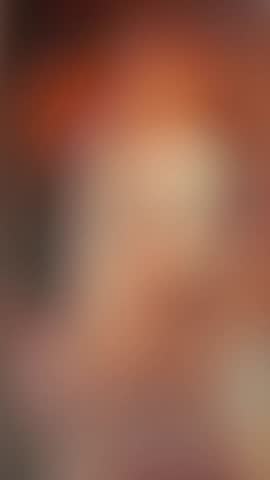 Super Slow Motion of Flying Fried Chicken Wings and Pieces. Abstract Blur Interior on Background. Filmed on High Speed Cinema Camera , 1000fps. Camera in Motion. Vertical Aspect Ratio.