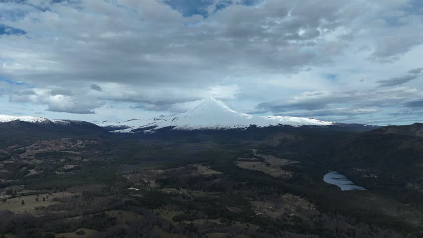 Majestic Snow-Capped Volcano with Clear Blue Sky