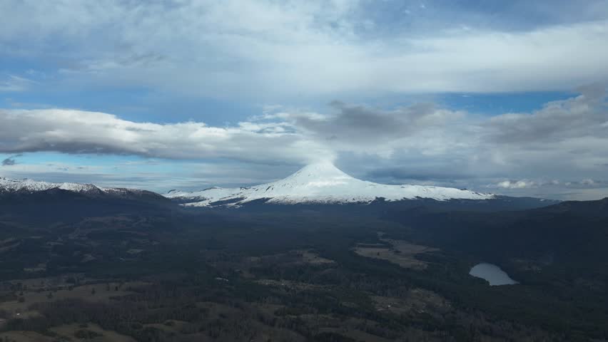 Majestic Snow-Capped Volcano with Clear Blue Sky