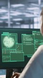 Vertical video Woman seeing critical error on PC screen in data center, requesting help from cybersecurity team. Employee seeing security incidents affecting server room network system, camera A - Powered by Shutterstock - Get 15% off with code: PIKWIZARD15