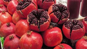Fresh red pomegranate for juice extraction, Thai street food in Bangkok, Thailand - Powered by Shutterstock - Get 15% off with code: PIKWIZARD15