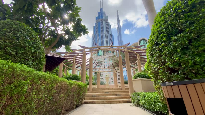 Young Man Enjoy A view of Al murooj Complex Near Dubai Mall Downtown Burj Khalifa