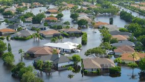 Hurricane flooded homes in residential community in Florida, USA. Aftermath of natural disaster - Powered by Shutterstock - Get 15% off with code: PIKWIZARD15