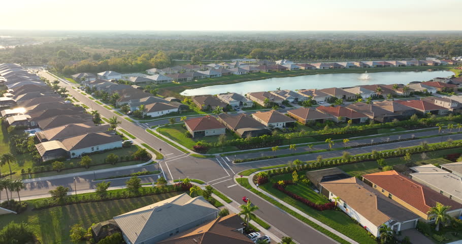 Large residential homes in southwest Florida gated community. American houses in rural US suburbs