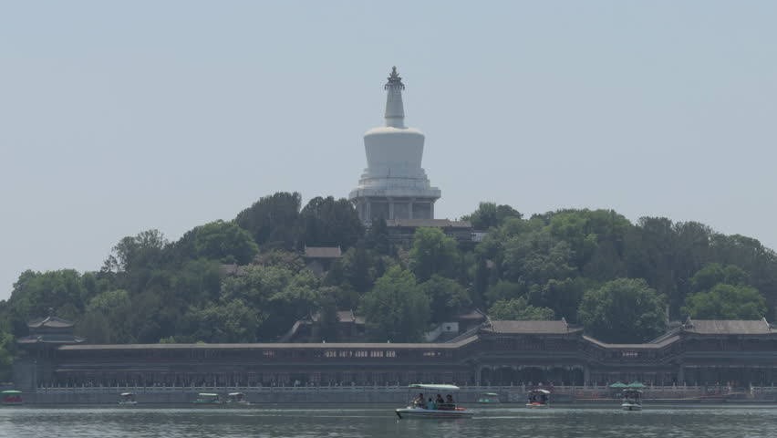 The White Pagoda, an iconic structure located at Beihai Park in Beijing, China, attracts visitors