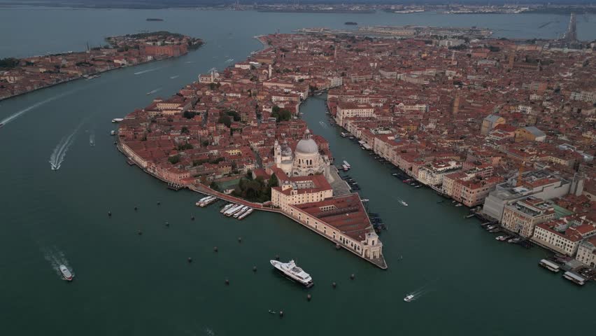 High-angle view of the Basilica di Santa Maria della Salute and surrounding Venetian canals.