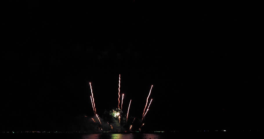 Celebration greeting Beautiful fireworks colorful fireworks on the beach for abstract background , anniversary, celebration , 4th independence day and new year background or wallpaper.