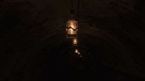 Row of old light bulbs shine on ceiling vault in dungeon tunnel. - Powered by Shutterstock - Get 15% off with code: PIKWIZARD15