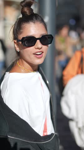 Exploring Trendy Urban Fashion in a Vibrant Sunlit Street Scene with Stylish Outfits