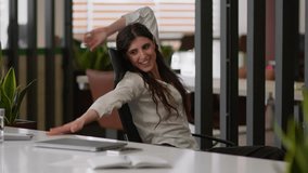 Caucasian business woman girl businesswoman office employee female manager finish online computer work at office close laptop break relax raise hands accomplish complete task spinning on chair happy - Powered by Shutterstock - Get 15% off with code: PIKWIZARD15