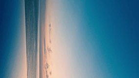 Vertical, Infinity Swimming Pool Beach Sea Blue Azure Yellow Orange Sunrise Sky and Cirrus Clouds Amazing Air View Relax Travel Vacation in Luxury Hotel with Ocean Villa, Beautiful Dawn Sea View Pool - Powered by Shutterstock - Get 15% off with code: PIKWIZARD15