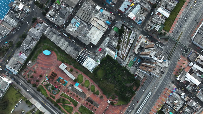 Top down drone shot over the Parque Renacimiento and city blocks Bogota, Colombia