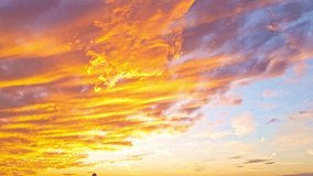Sunset Sky timelapse. Moving clouds and sunset. Clouds float through the evening. Dusk twilight sky time lapse. Dramatic skies are moving. Cumulus and cirrus on storm. Sunrise cloudscape. - Powered by Shutterstock - Get 15% off with code: PIKWIZARD15
