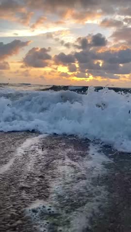 Capturing the serene scene of a calm beach during sunset. Perfect landscape background and summer holiday concept