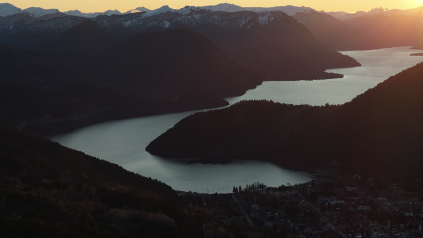 Flying at sunset in San Martín de los Andes City and Lácar Lake. Route 40. Neuquén, Patagonia, Argentina