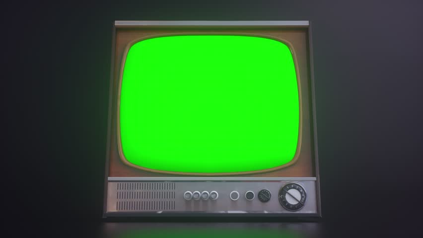 Old TV Set with green screen. Old television with noise and green screen in empty dark studio