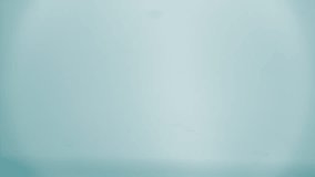 Natural mineral water splashing. Crystal clear drop of cosmetic essence serum falling in slow motion. Body moisturizing cosmetics formulating. Commercial beauty product blue liquid abstract background - Powered by Shutterstock - Get 15% off with code: PIKWIZARD15