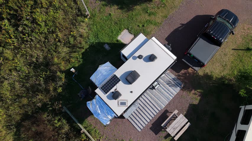 Aerial 4K drone view of camper at Saxon Harbor camp ground in northern Wisconsin on Lake Superior