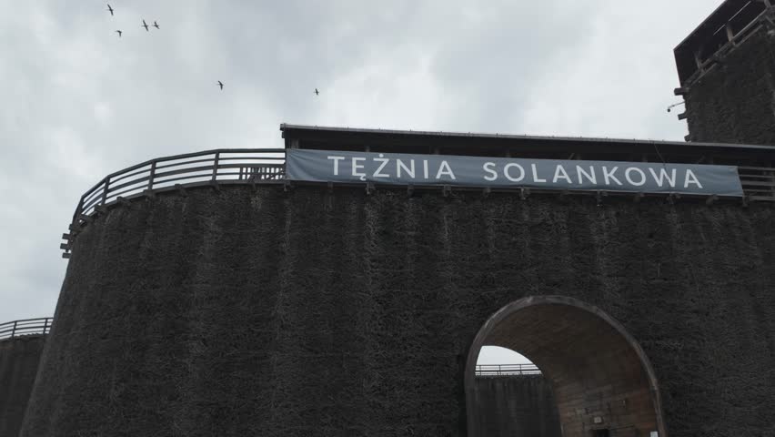 Brine graduation tower in Wieliczka Salt Mines, Krakow, Poland with overcast sky and historic architecture